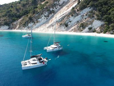 Exterior view of EVI, a Lagoon 450 F catamaran at Kontokali, Greece