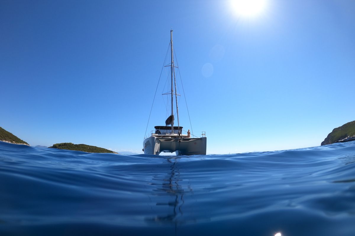 Exterior view of EVI, a Lagoon 450 F catamaran at Kontokali, Greece
