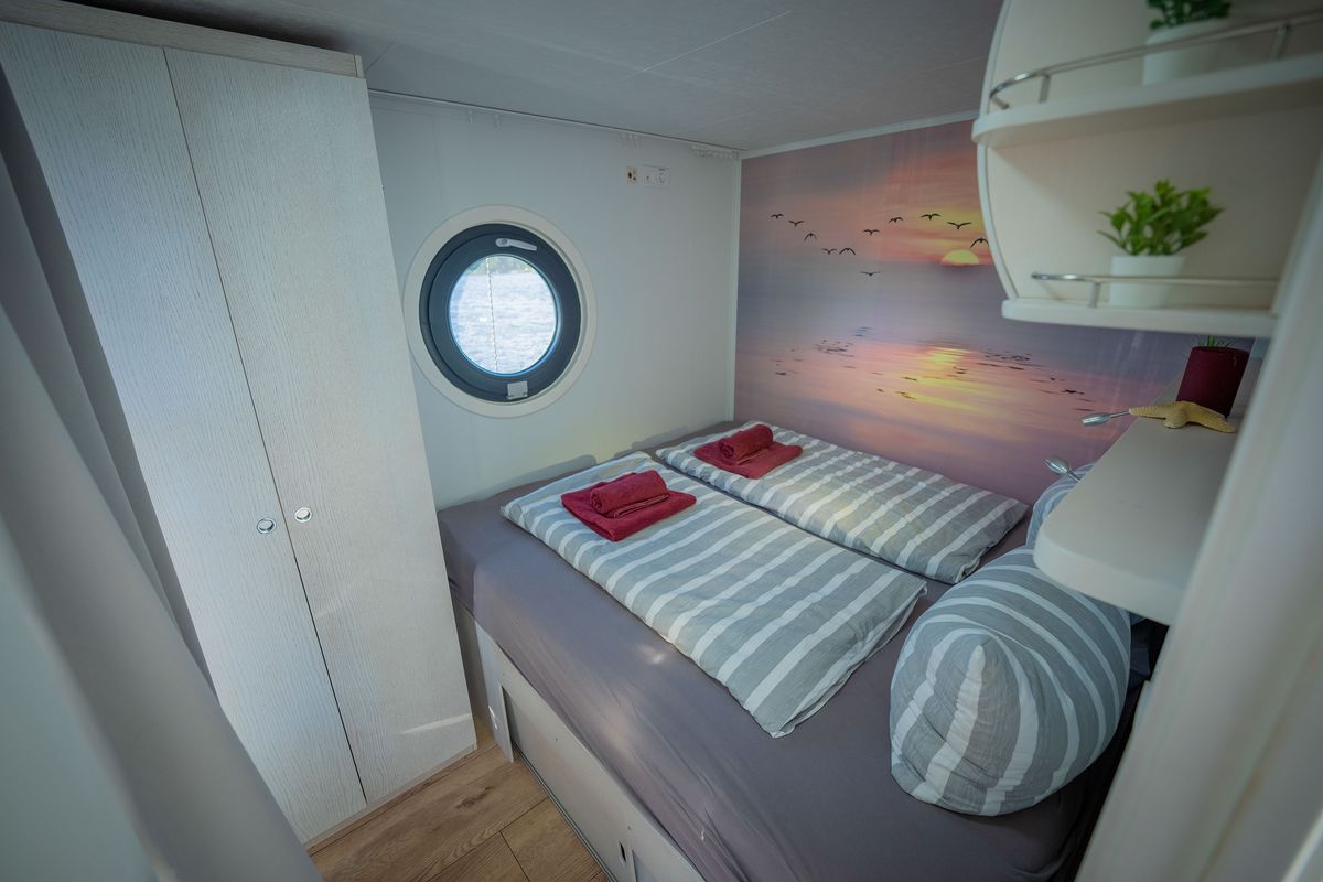 Cabin on Roma, a Woma D13 motorboat at Fürstenberg/Havel, Germany