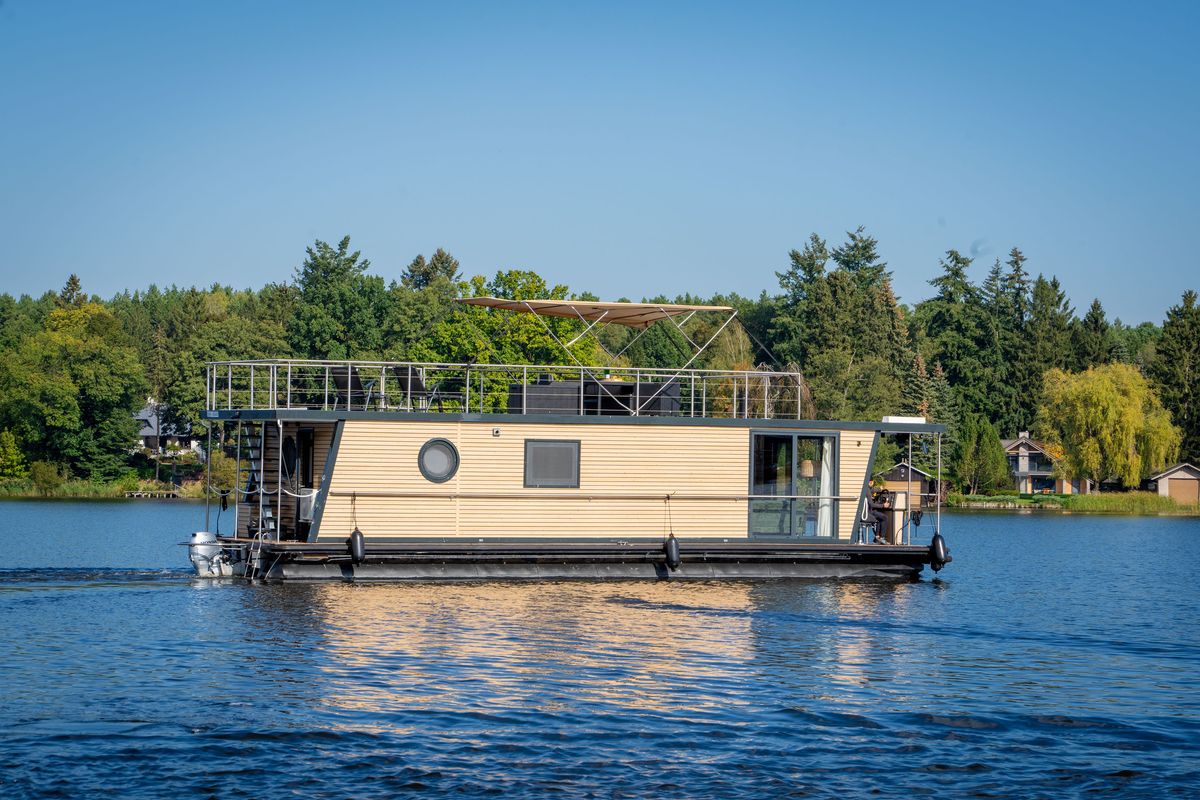 Exterior view of Roma, a Woma D13 motorboat at Fürstenberg/Havel, Germany