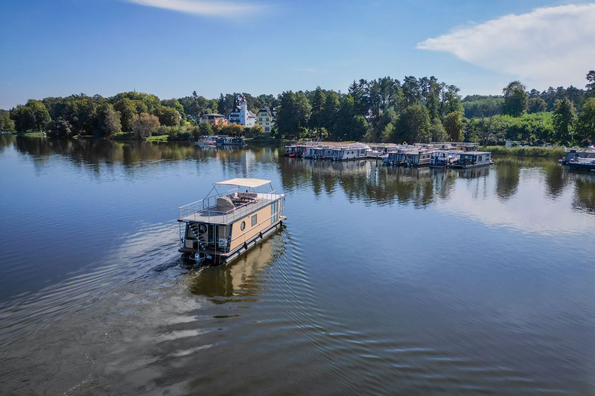 Exterior view of Roma, a Woma D13 motorboat at Fürstenberg/Havel, Germany
