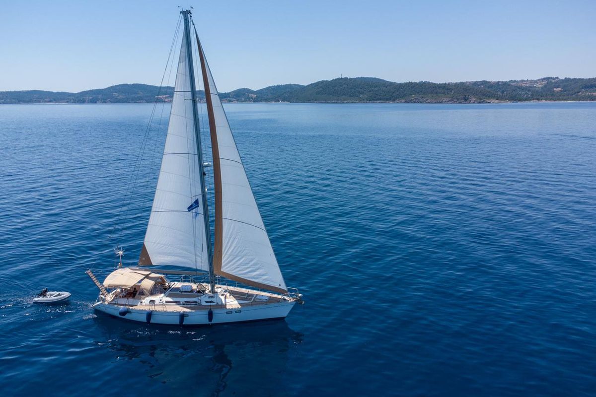 Exterior view of Stavros tou Notou, a Jeanneau 51 sailboat at Flisvos Marina, Greece