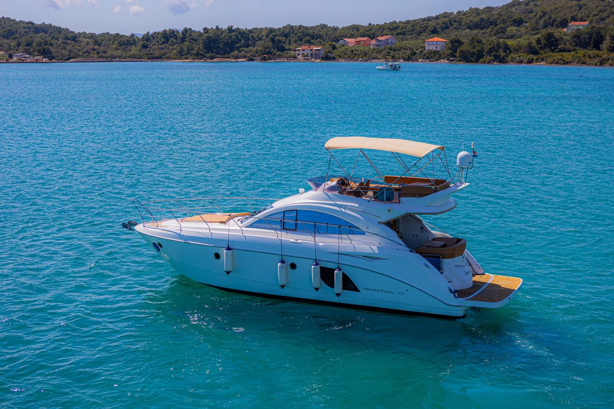 Exterior view of Lamona, a Beneteau Monte Carlo 47 Fly yacht at Općina Sukošan, Croatia