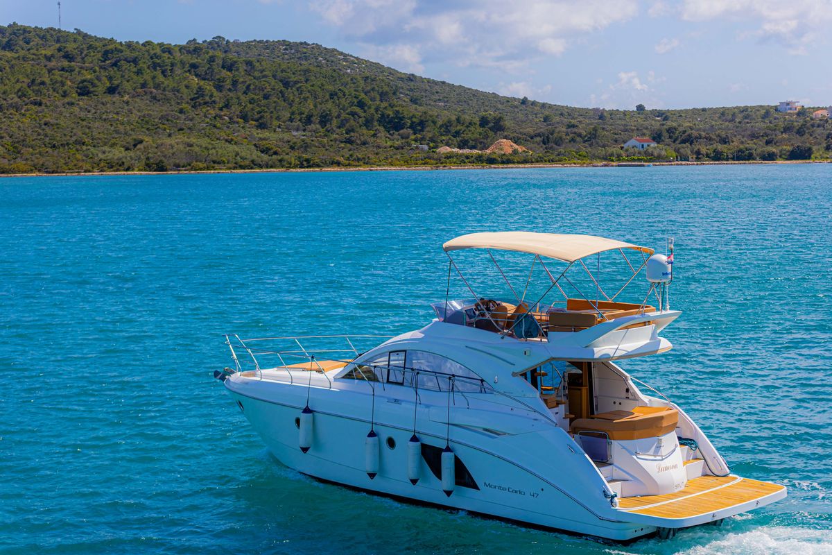 Exterior view of Lamona, a Beneteau Monte Carlo 47 Fly yacht at Općina Sukošan, Croatia