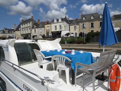 Deck of Vivat, a Nicols Confort 1350 motorboat at Grez-Neuville, France