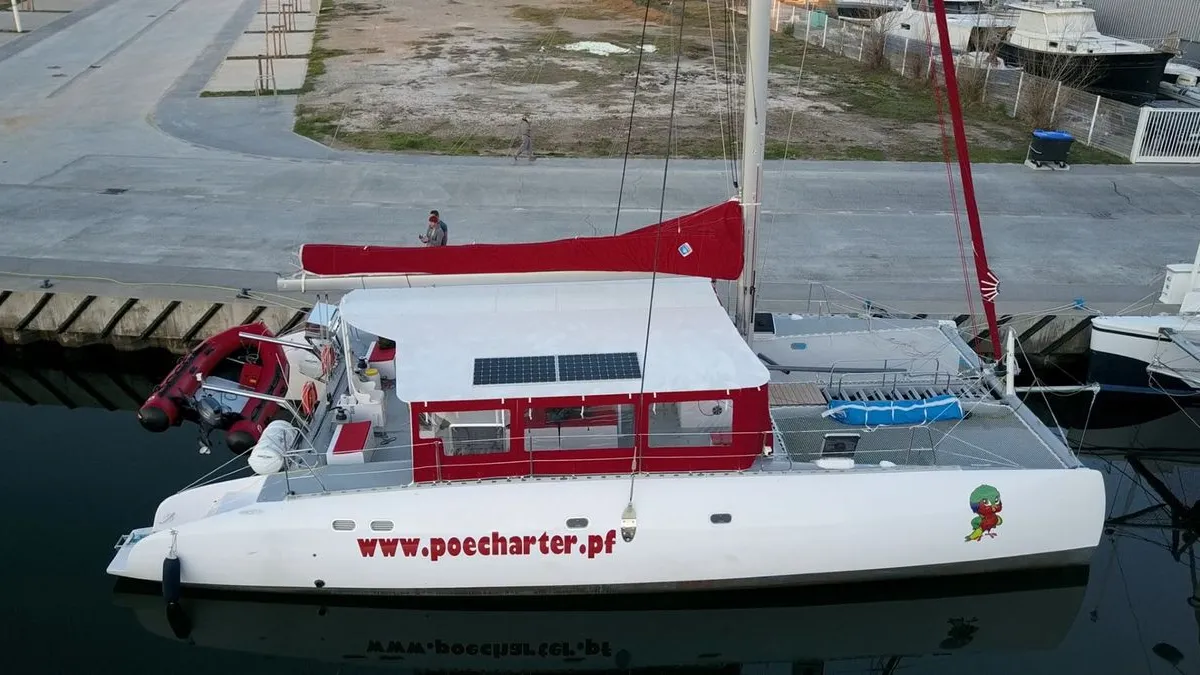 Exterior view of Poe Nui, a Gulet Ocean Voyager 53 catamaran at Papeete, France