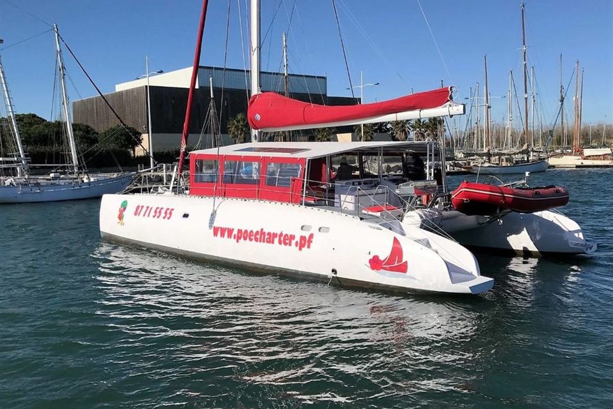 Exterior view of Poe Nui, a Gulet Ocean Voyager 53 catamaran at Papeete, France