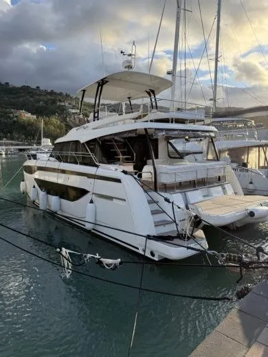 Main, a Prestige Prestige M48 catamaran at Giardini Naxos, Italy
