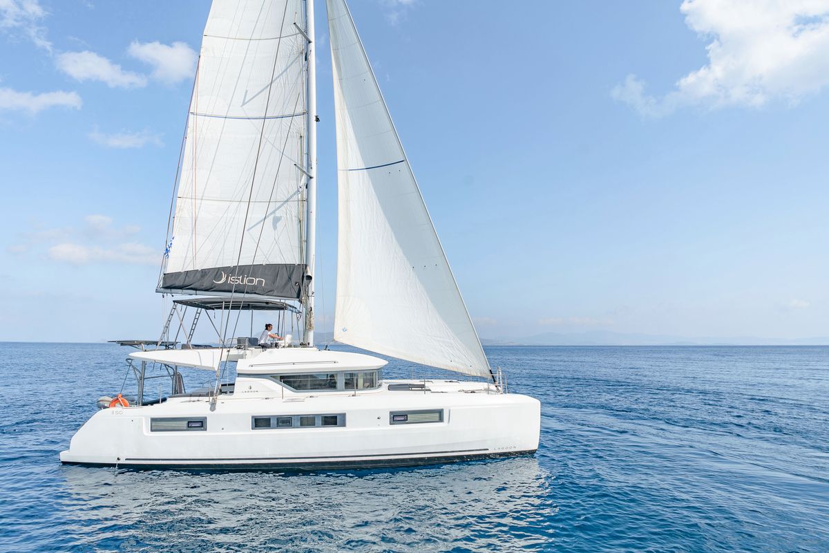 Exterior view of Just Infinity, a Lagoon 50 catamaran at Gouvia, Greece