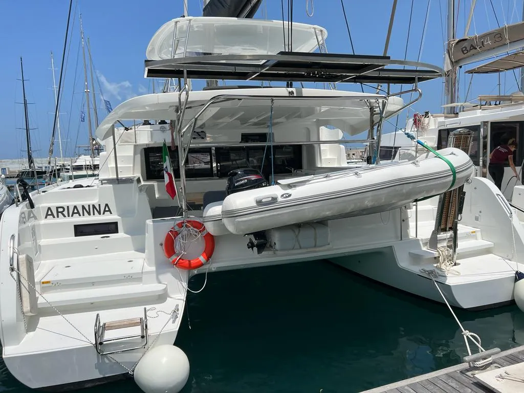 Exterior view of Arianna, a Lagoon 46 Fly catamaran at Capo d'Orlando, Italy