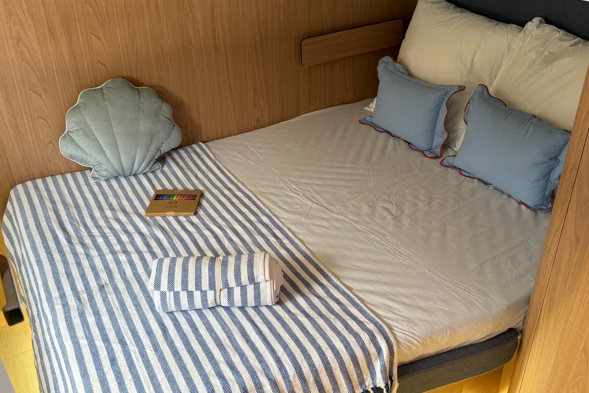Cabin on Boca Chica, a Bali 5.2 catamaran at Olbia, Italy
