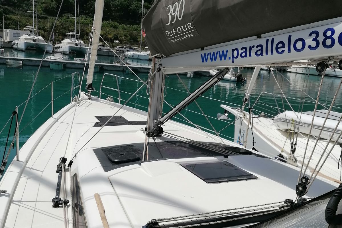 Exterior view of Parbleu, a Dufour 390 Grand Large sailboat at Capo d'Orlando, Italy