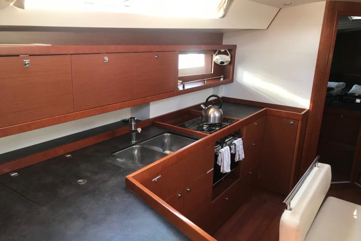Galley of Alboran Gin Fizz, a Beneteau Oceanis 45 sailboat at es Jonquet, Spain