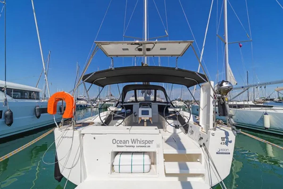 Exterior view of Ocean Whisper, a Dufour 430 sailboat at Port of Avdira, Greece