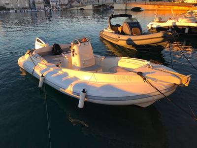 Exterior view of Envy Tender, a Scanner 710 motorboat at Grad Trogir, Croatia