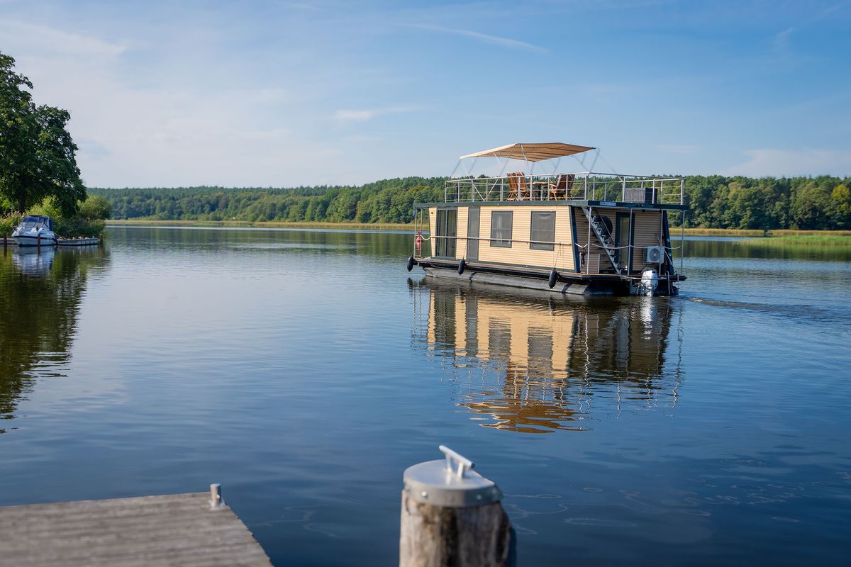 Exterior view of Juno, a Woma D13 motorboat at Fürstenberg/Havel, Germany