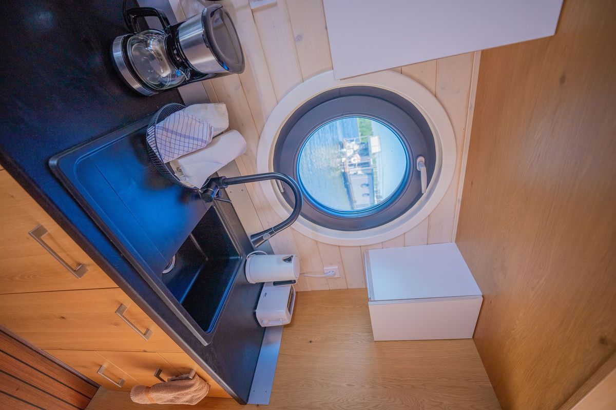 Galley of Juno, a Woma D13 motorboat at Fürstenberg/Havel, Germany