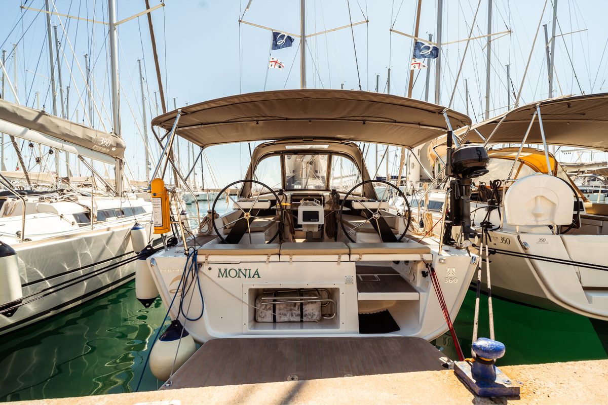 Exterior view of Monia, a Dufour 360 Grand Large sailboat at Olbia, Italy