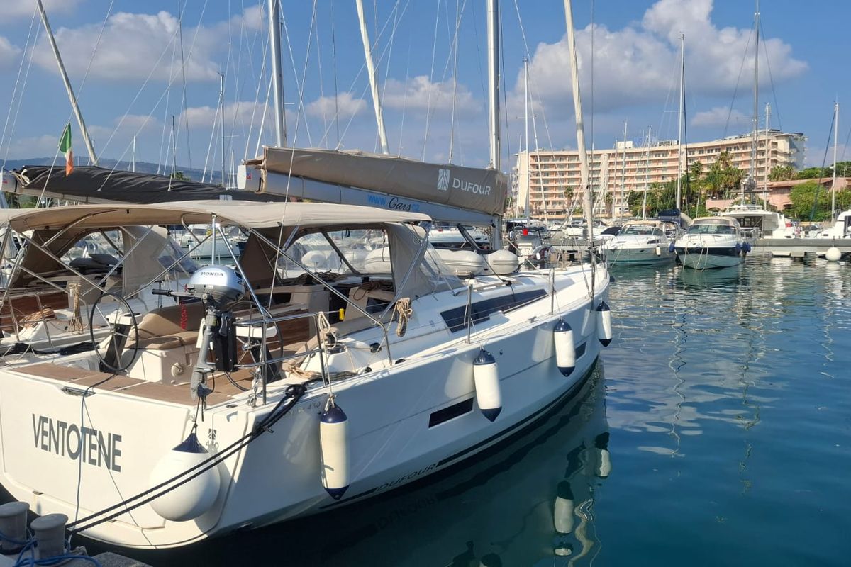 Exterior view of Ventotene, a Dufour 430 GL sailboat at Tonnarella, Italy