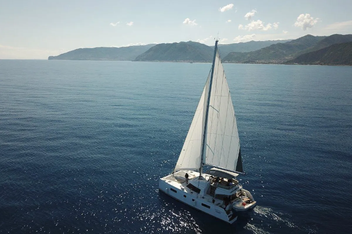 Cockpit of Calypso, a Nautitech 46 Fly catamaran at Capo d'Orlando, Italy
