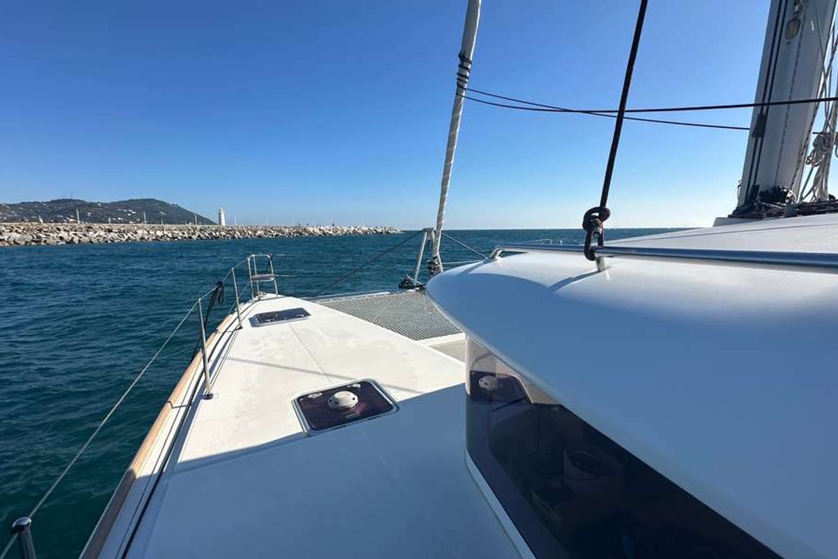 Exterior view of Branchia, a Lagoon 450 Fly catamaran at Naples, Italy