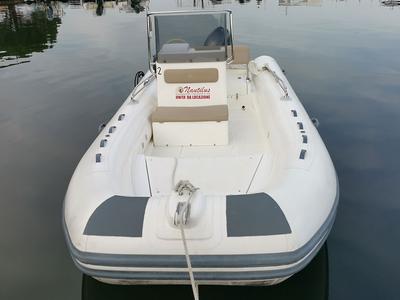 Exterior view of N. 10, a Capelli Tempest 530 rib at Cannigione, Italy