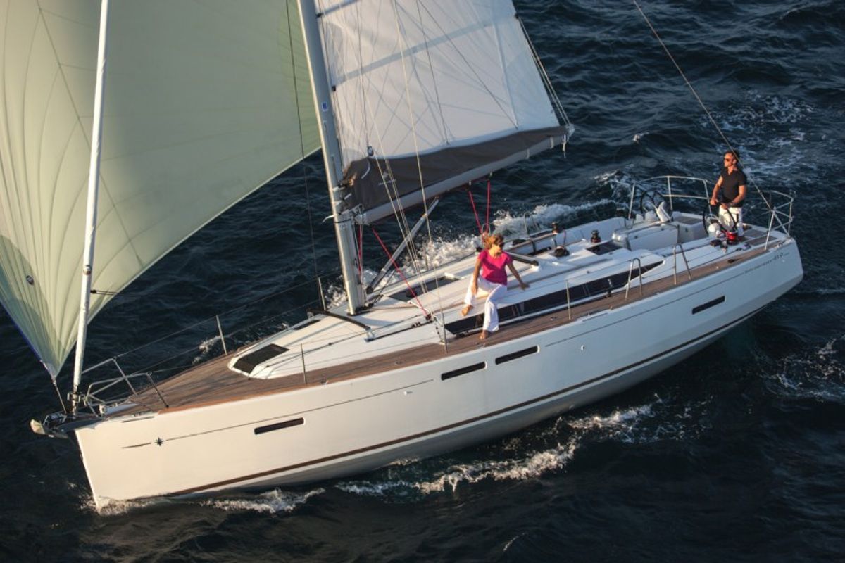 Exterior view of Kinthia, a Jeanneau Sun Odyssey 419 sailboat at Lavreotiki Municipal Unit, Greece