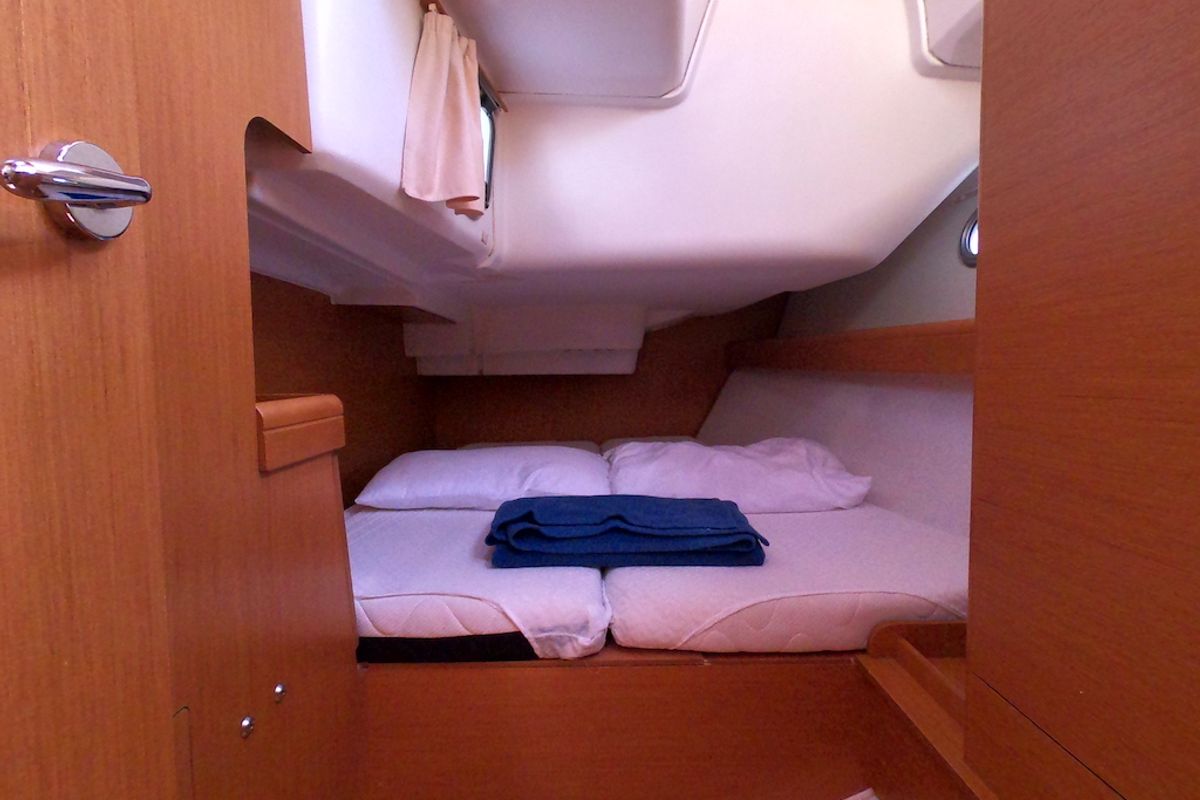 Cabin on Praha, a Jeanneau Sun Odyssey 42i sailboat at Olbia, Italy