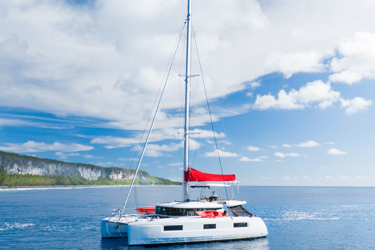 Exterior view of Poe Rava, a Lagoon 46 catamaran at Papeete, France