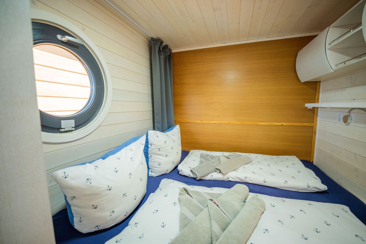 Cabin on Brino, a Woma D13 motorboat at Fürstenberg/Havel, Germany