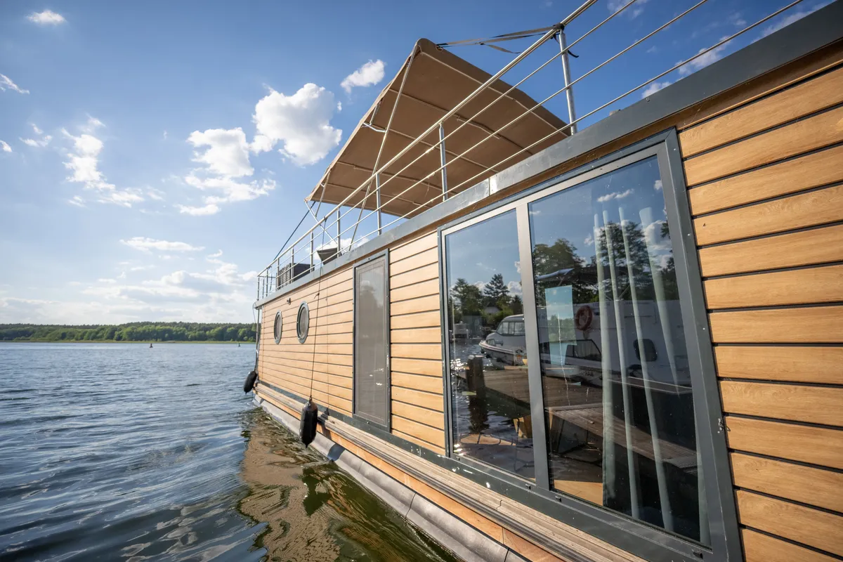 Exterior view of Brino, a Woma D13 motorboat at Fürstenberg/Havel, Germany