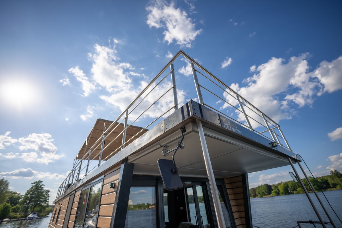 Exterior view of Brino, a Woma D13 motorboat at Fürstenberg/Havel, Germany