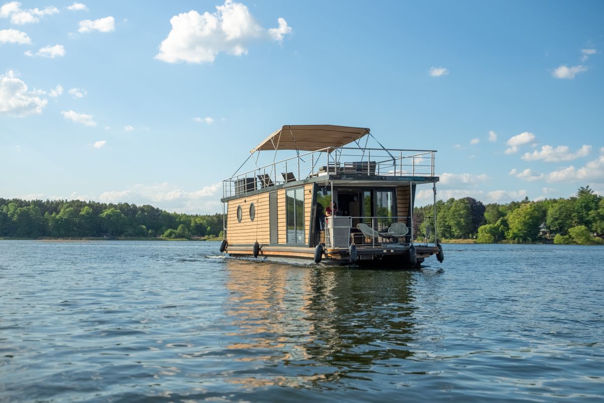 Exterior view of Brino, a Woma D13 motorboat at Fürstenberg/Havel, Germany