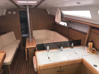 Salon of Lyra, a Jeanneau Sun Odyssey 36i sailboat at Olbia, Italy