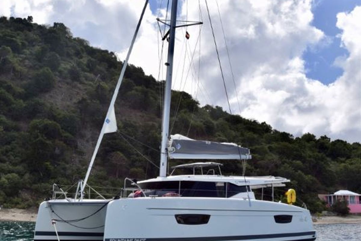 Exterior view of Firefly, a Fountaine Pajot Isla 40 catamaran at Road Town, British Virgin Islands