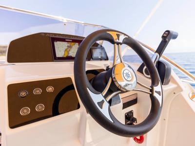 Cockpit of 275322ML, a Atlantic Marine Sun Cruiser 690 motorboat at Mali Lošinj, Croatia