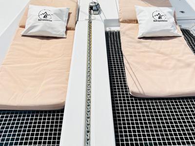 Deck of Olokum Mallorca Crewed, a Excess 11 catamaran at Port d'Andratx, Spain