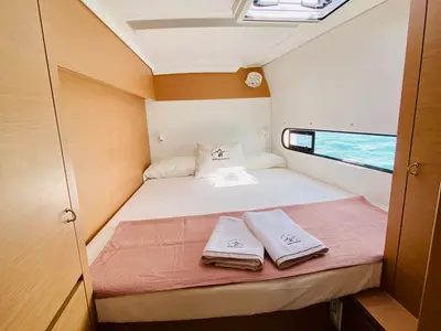 Cabin on Olokum Mallorca Crewed, a Excess 11 catamaran at Port d'Andratx, Spain