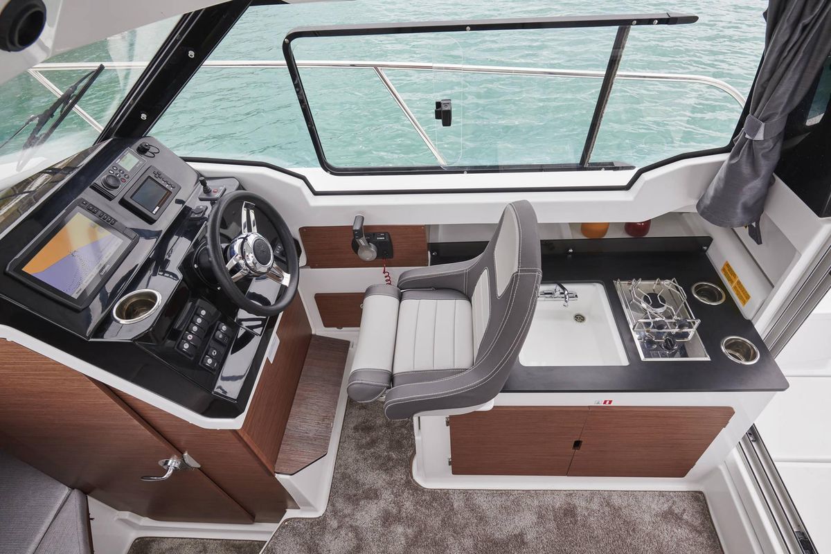 Cockpit of Merry Fisher, a Jeanneau Merry Fisher 795 motorboat at Grad Vodice, Croatia