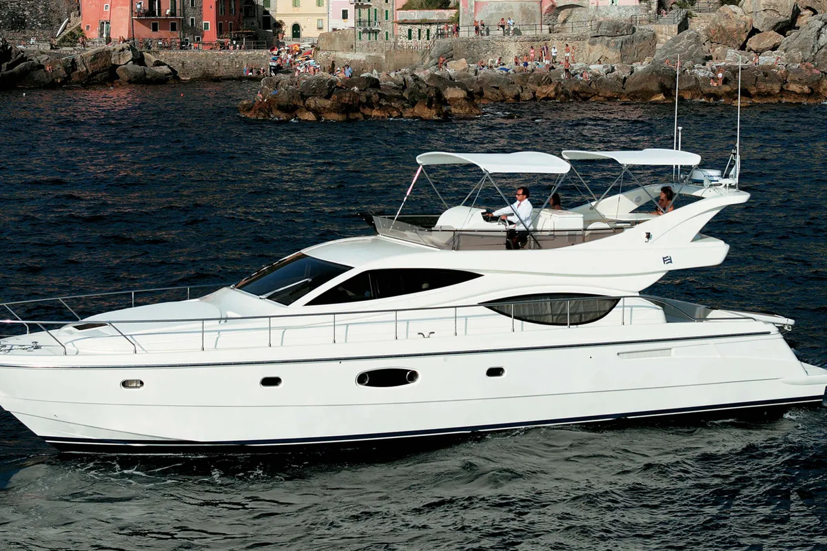 Exterior view of The Boat, a Ferretti 550 motorboat at Panaji, India