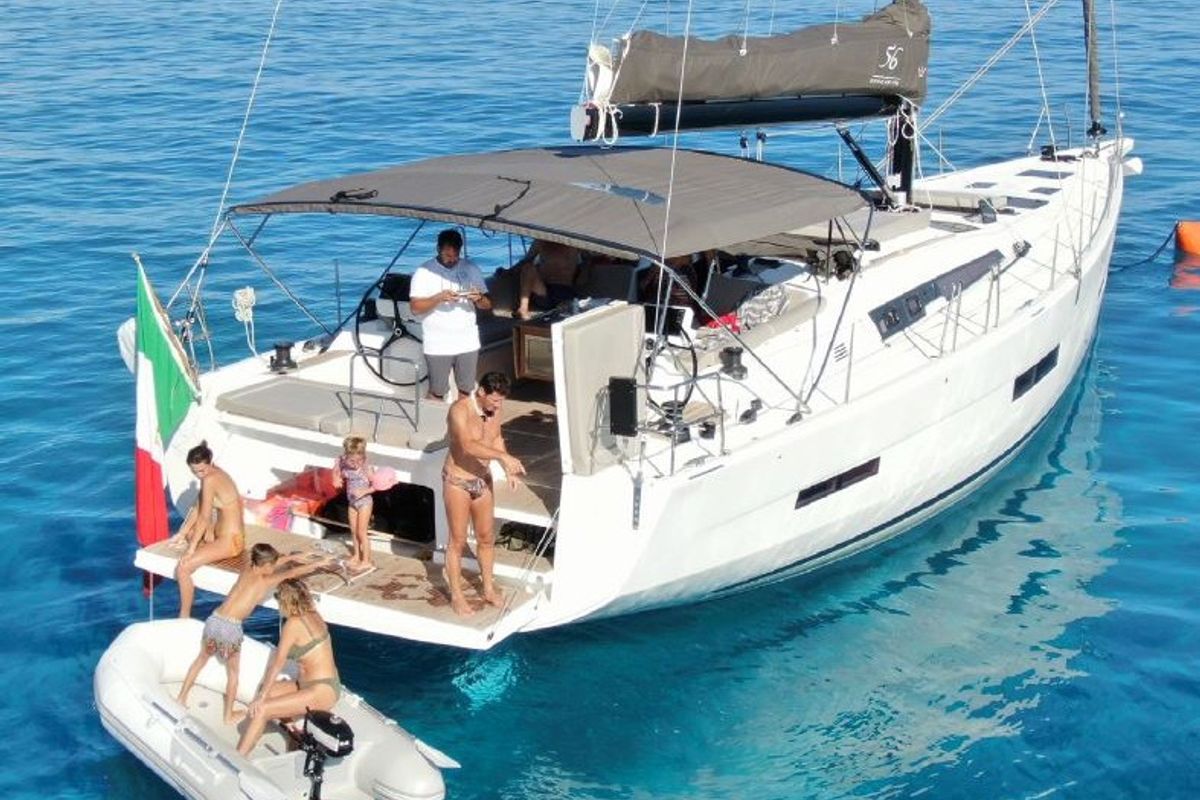 Exterior view of Cavaliere, a Dufour 56 Exclusive sailboat at Capo d'Orlando, Italy