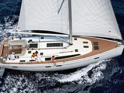 Exterior view of Papaya, a Bavaria Cruiser 51 sailboat at Port de Pollença, Spain