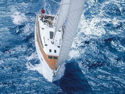 Exterior view of Papaya, a Bavaria Cruiser 51 sailboat at Port de Pollença, Spain