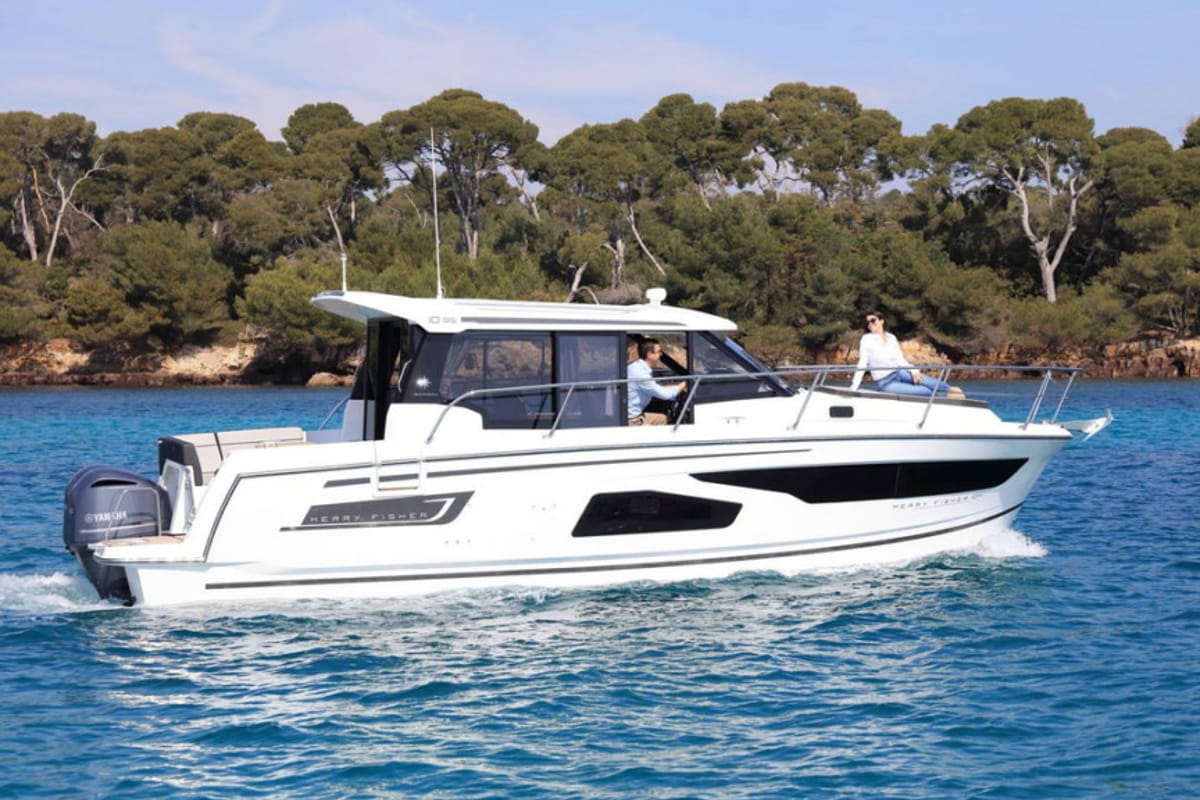 Exterior view of Dusar, a Jeanneau Merry Fisher 1095 motorboat at Cannigione, Italy