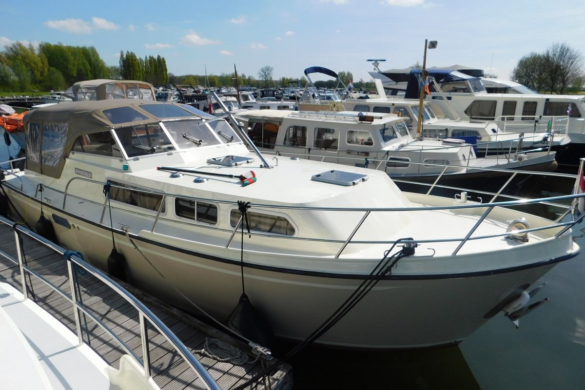 Exterior view of Marmeralk, a Delos 1100 Cruiser motorboat at IJsselstein, Netherlands