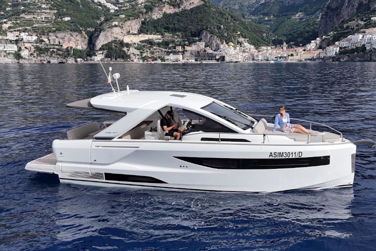 Exterior view of The Beginning, a Jeanneau DB/37 motorboat at Pogerola, Italy