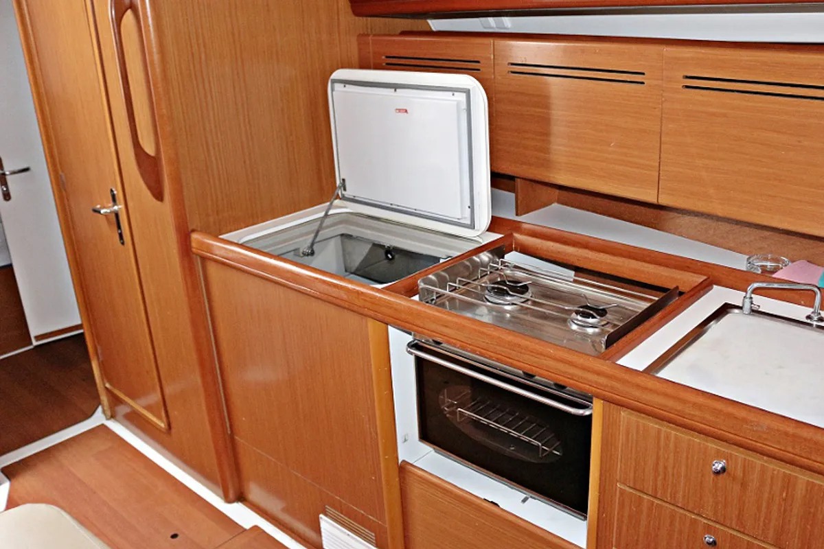 Galley of Via Col Vento, a Beneteau Cyclades 39.3 sailboat at Milazzo, Italy