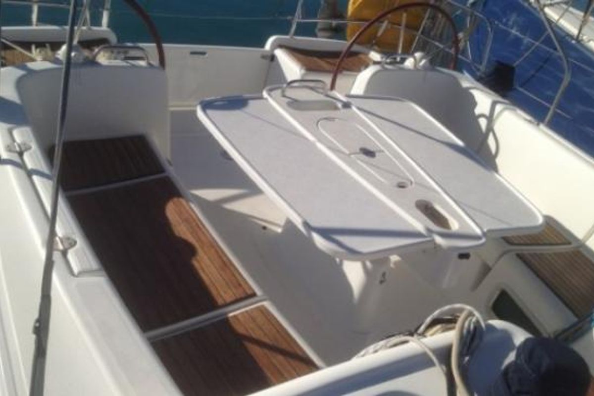 Salon of Via Col Vento, a Beneteau Cyclades 39.3 sailboat at Milazzo, Italy