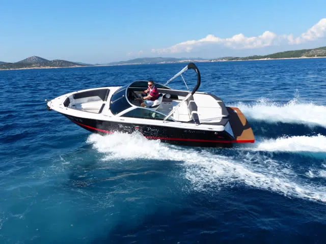 Exterior view of Black Pearl, a Four Winns Boats Four Winns H210 motorboat at Tribunj, Croatia