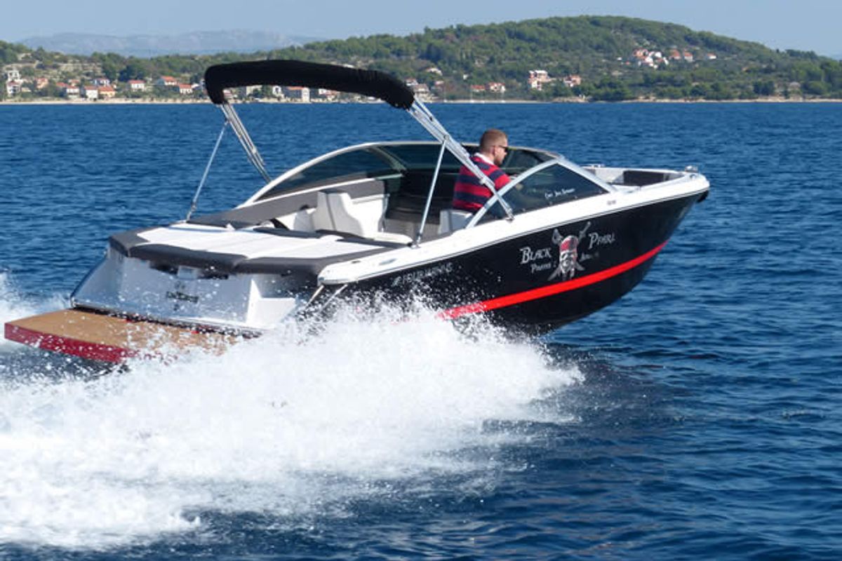 Exterior view of Black Pearl, a Four Winns Boats Four Winns H210 motorboat at Tribunj, Croatia